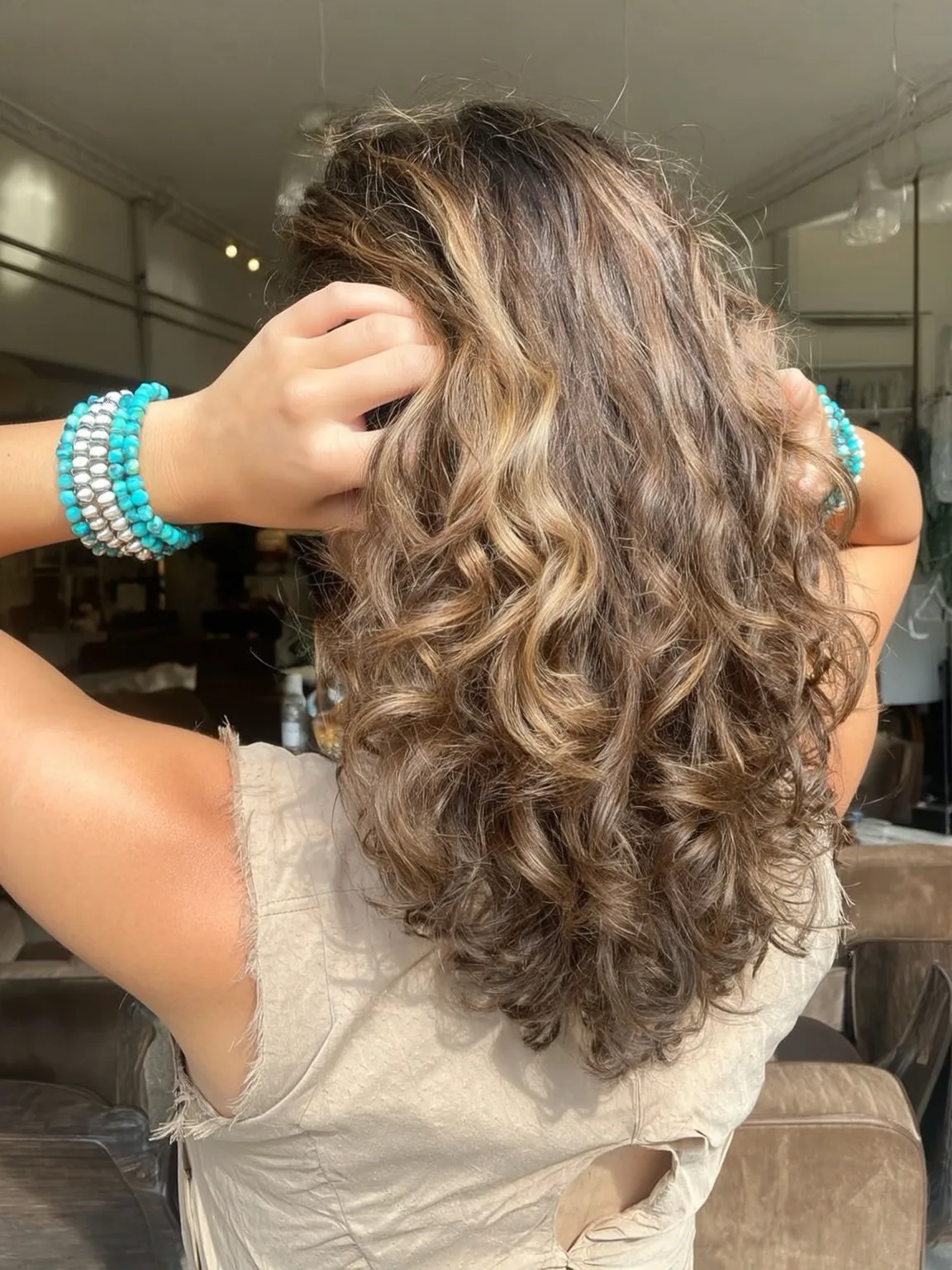 Long Honey Blonde Balayage Layers with Full Curly Texture