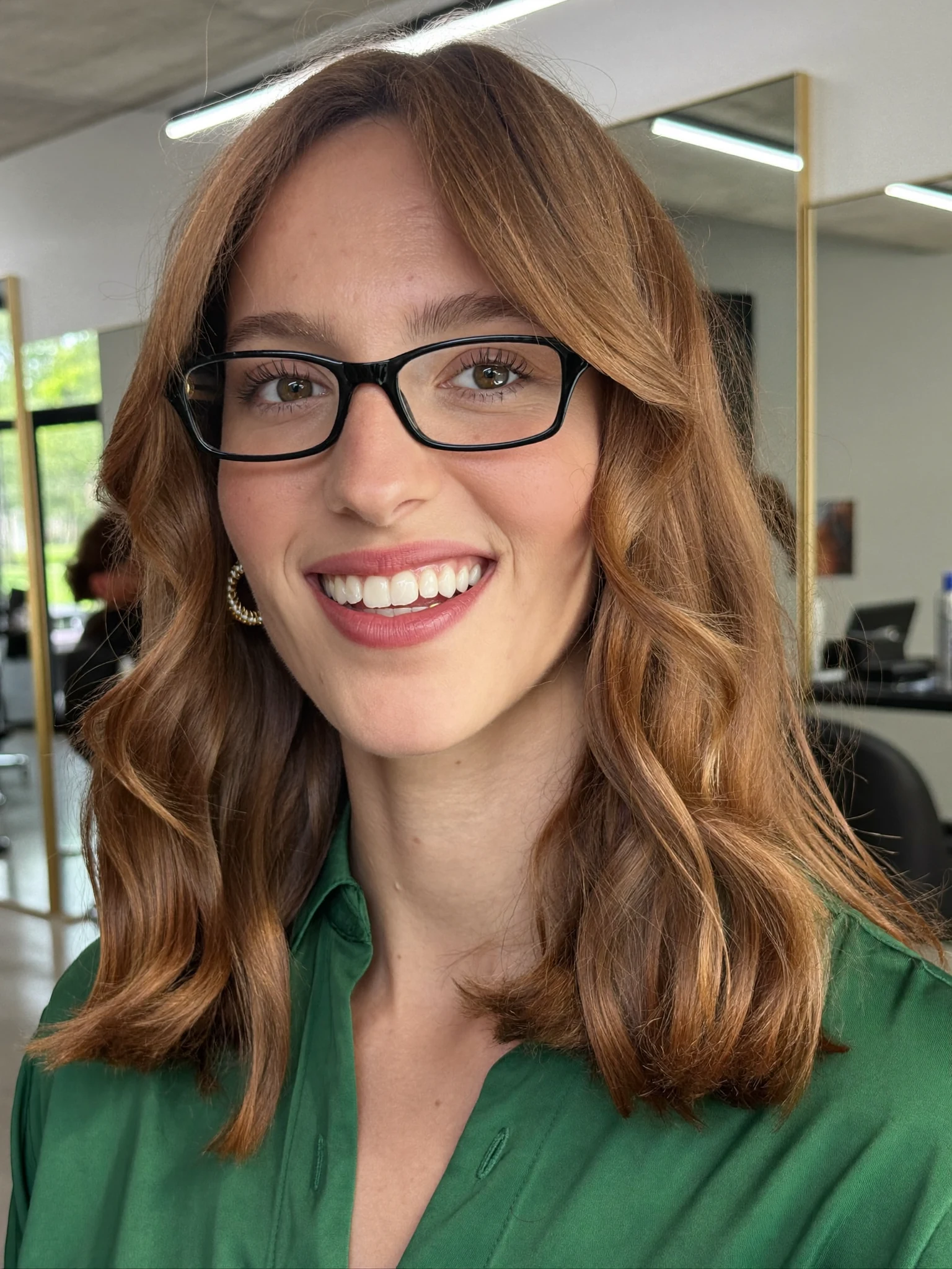 Shoulder-Length Caramel Lob with Loose Waves and Curtain Bangs