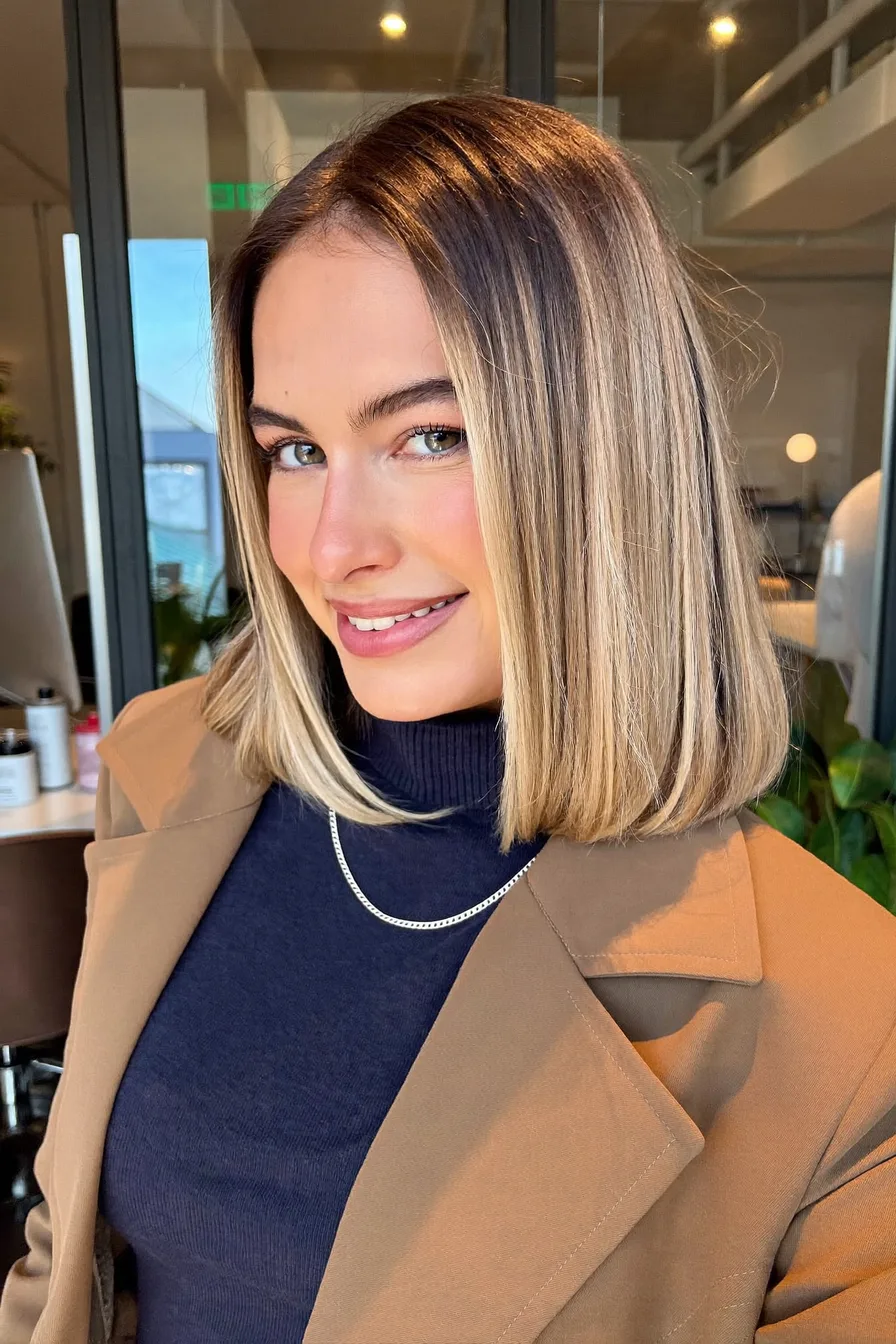 Sleek Blunt Bob with Center Part and Ash Blonde Balayage
