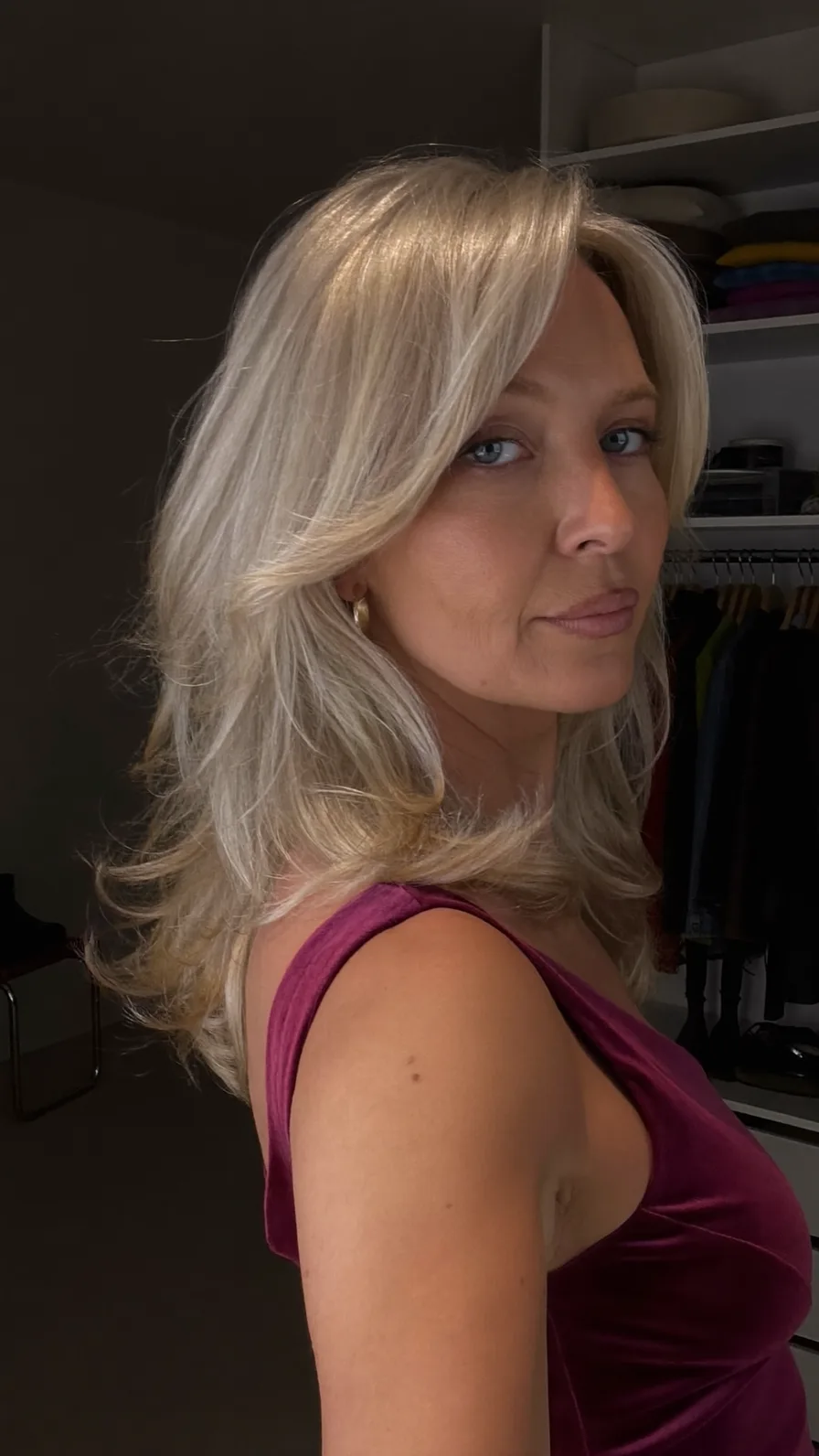 Elegant Shoulder-Length Layered Flicked Cut with Side-Swept Bangs
