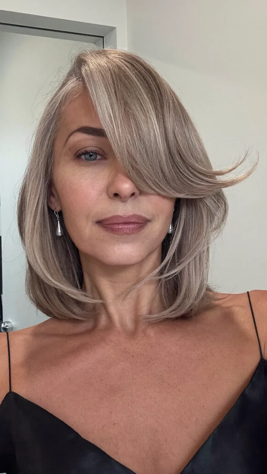 Elegant Shoulder-Length Layered Lob with Side-Swept Bangs