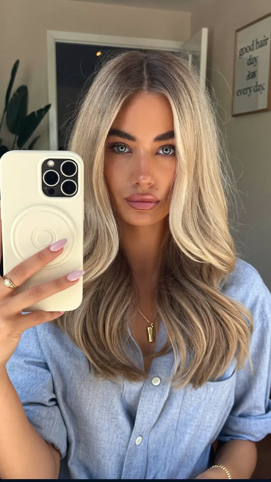 Medium-Length Ash Blonde Hair with Long Layered Waves