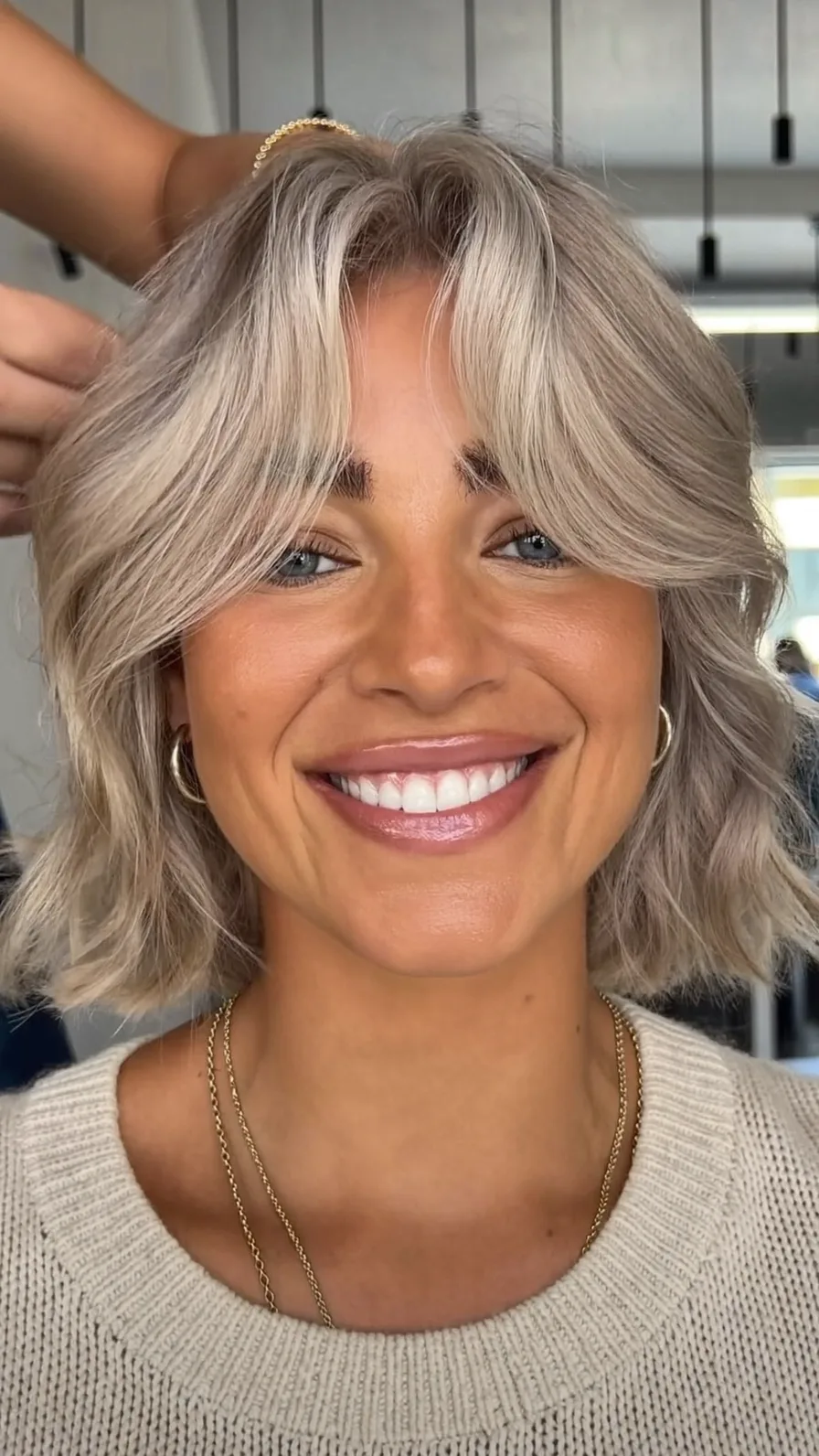 Textured Layered Chin-Length Bob with Cool Ash Blonde Dimension