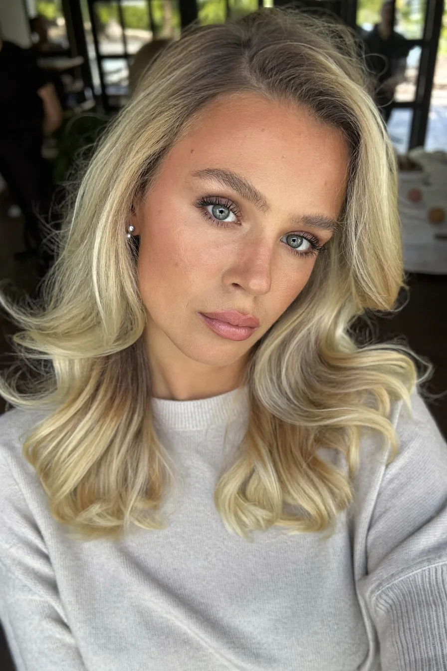 Soft Flowing Blonde Long Layers with Balayage Highlights