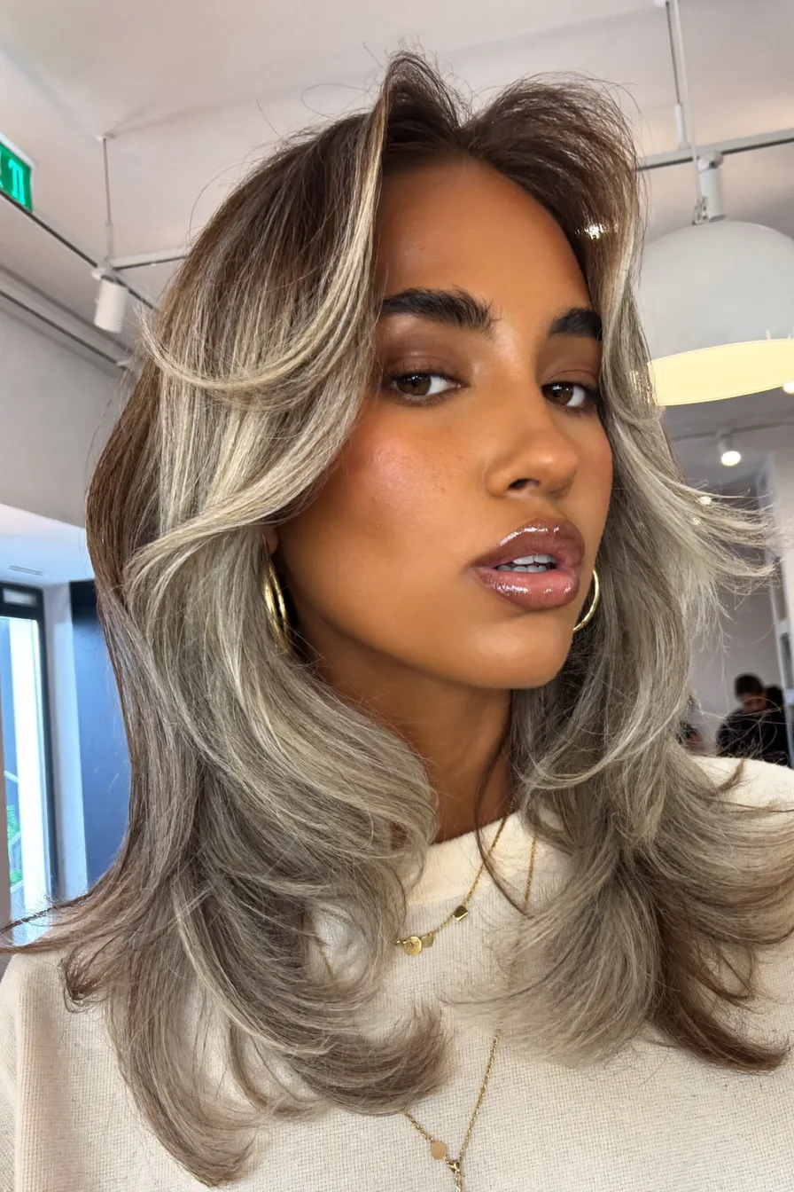 Face-Framing Layers with Soft Ash Blonde Highlights and Volume