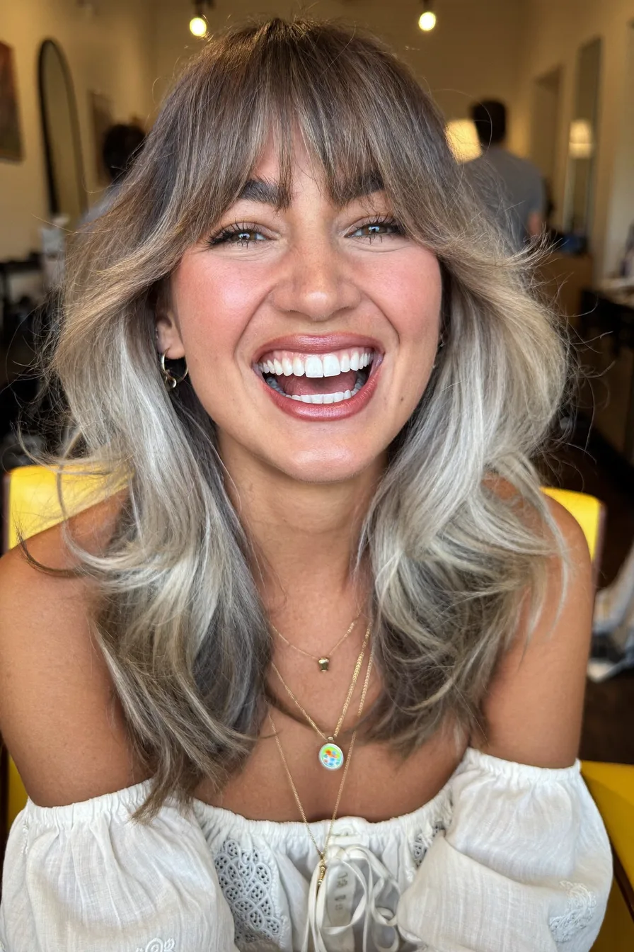 Soft Layered Ash Blonde with Wispy Curtain Bangs