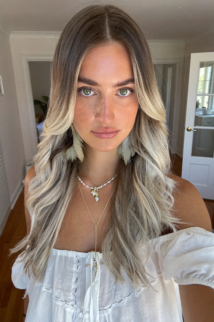 Modern Long Layered Waves With Balayage And Curtain Bangs