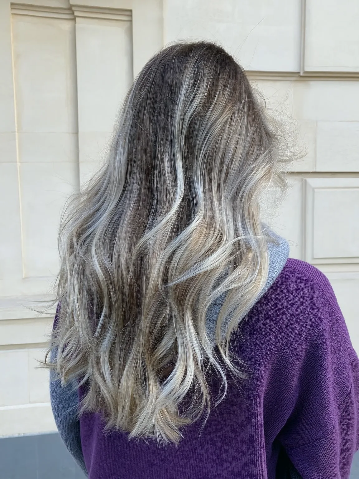 Long Wavy Layers with Balanced Ash Blonde Balayage