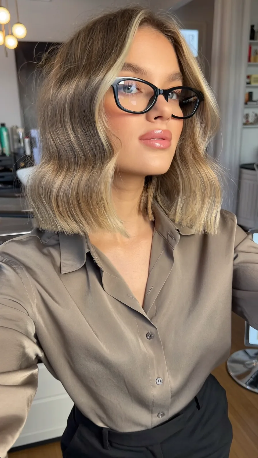 Chic Shoulder-Length Lob with Cool Blonde Babylights and Glasses