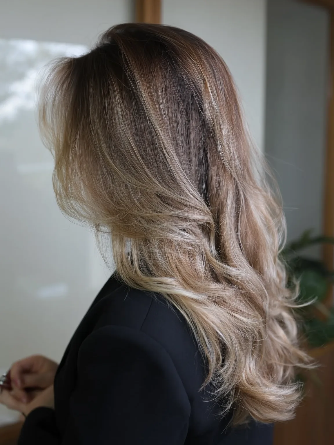 Voluminous Ash Blonde Balayage Layers with Wavy Texture