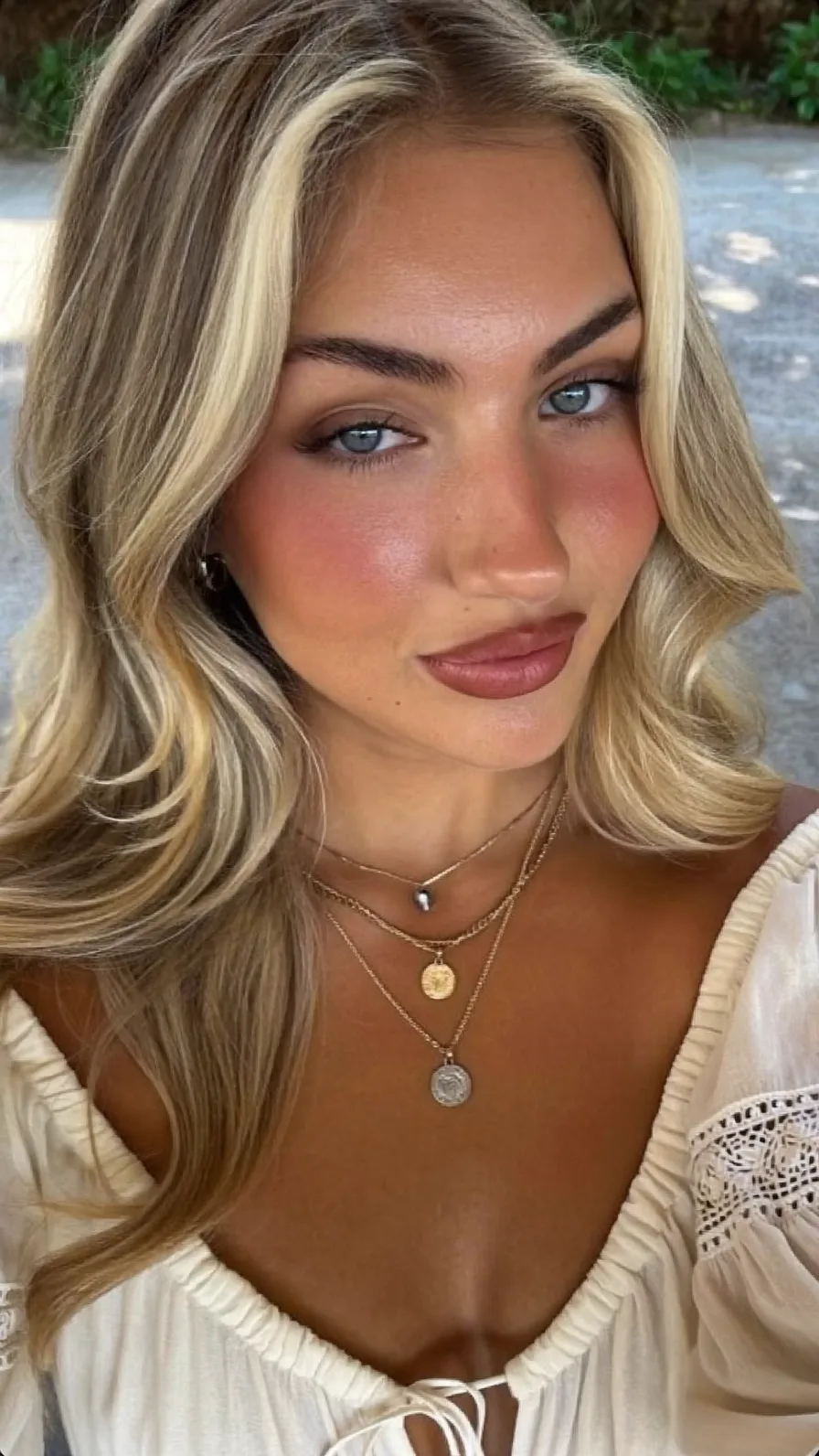 Long Layered Hair with Money-Piece Curtain Bangs