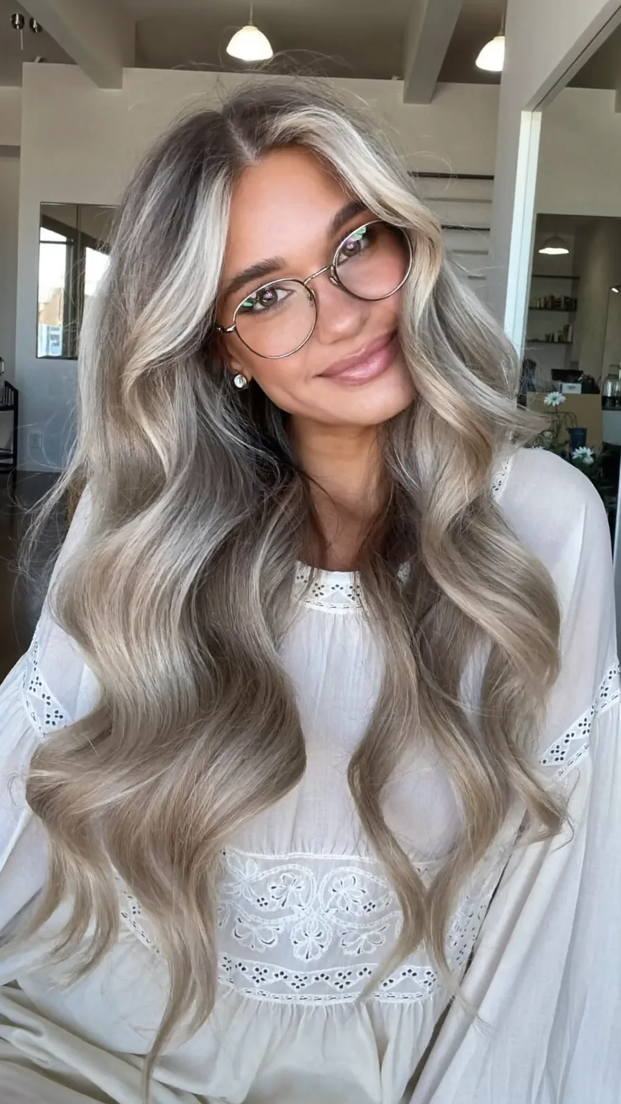 Voluminous Long Layers with Platinum Money-Piece Curtain Bangs