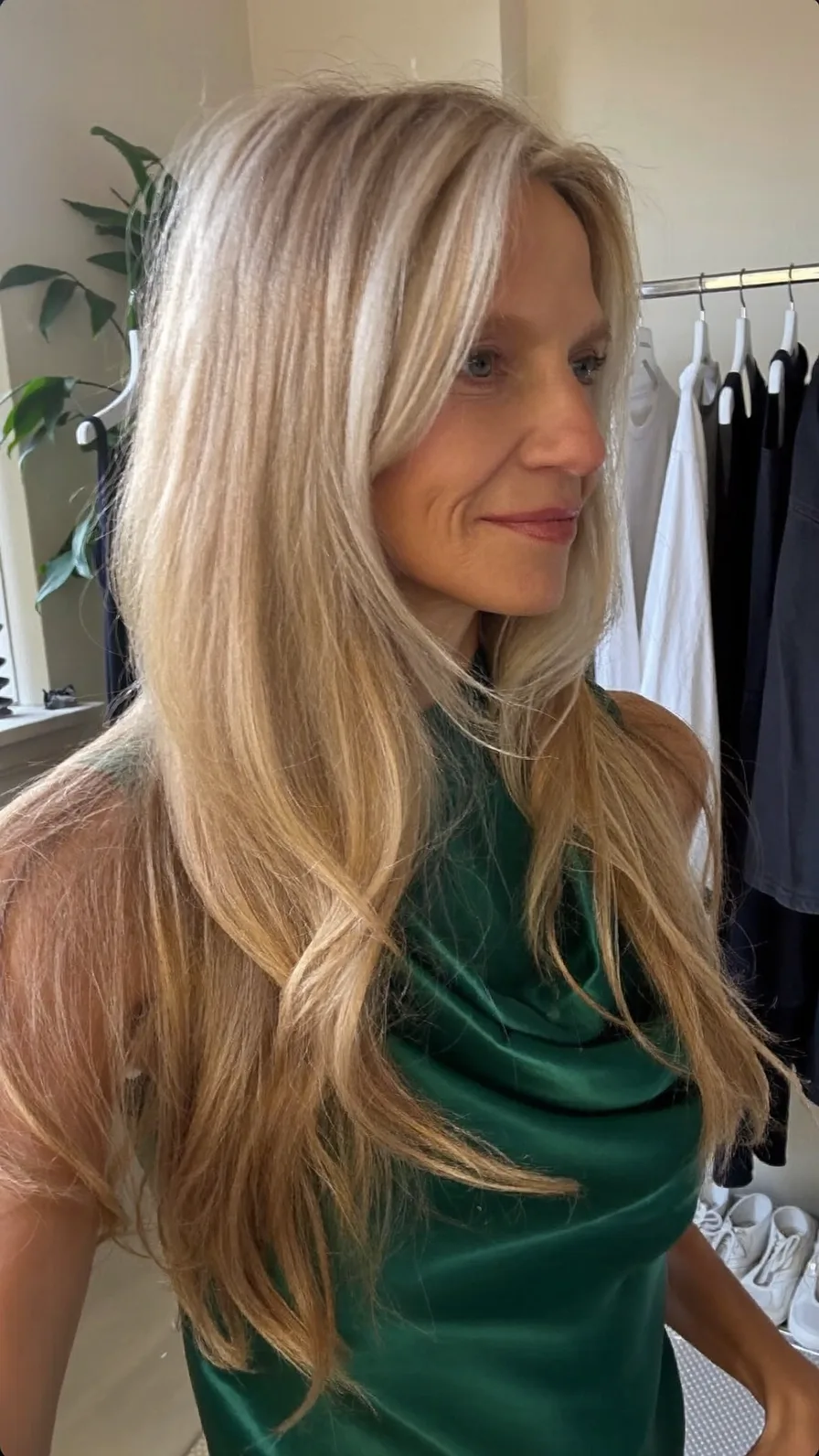 Long Layered Blonde Hairstyle with Soft Curtain Bangs