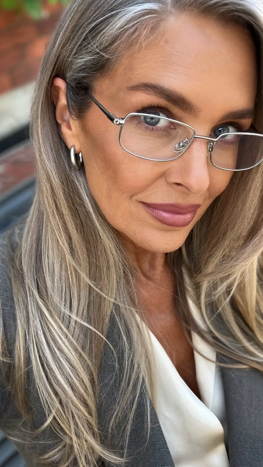 Elegant Long Layers with Ash Blonde Silver Highlights