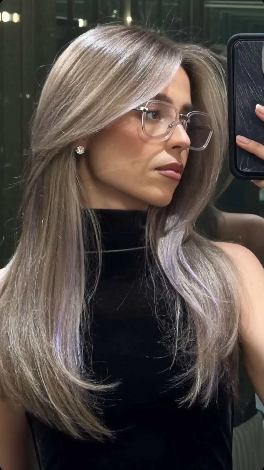 Sophisticated Long Layered Ash Blonde Hairstyle With Side-Swept Bangs