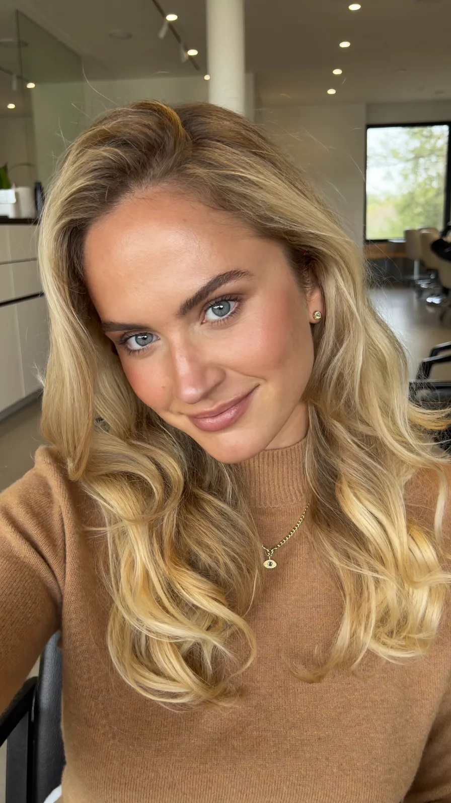 Flowing Long Layers with Warm Multi-Dimensional Blonde Highlights