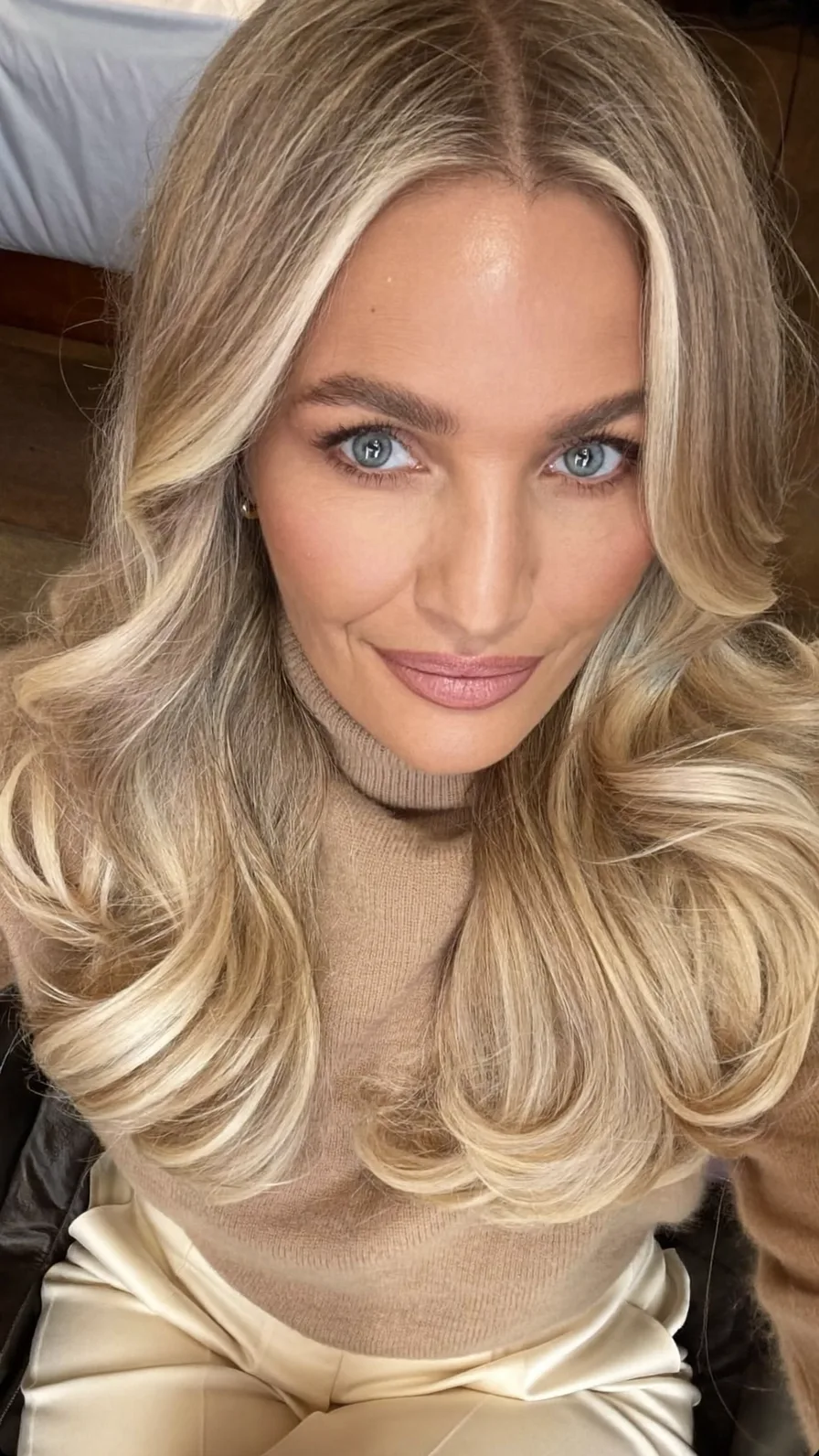 Elegant Long Layered Voluminous Waves with Blonde Highlights