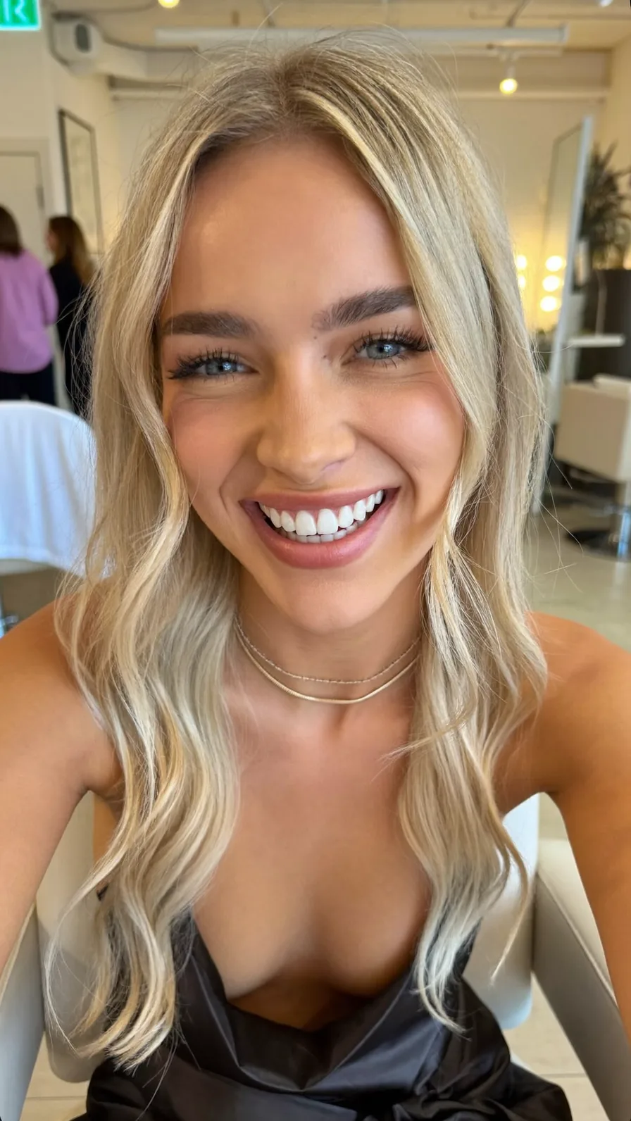 Modern Trendy Long Layered Wavy Cool Ash Blonde Hairstyle