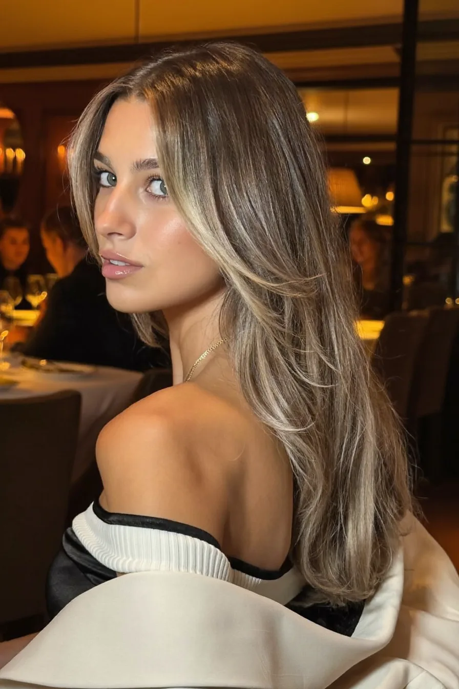 Flowing Long Layers with Cool Ash Balayage and Curtain Bangs