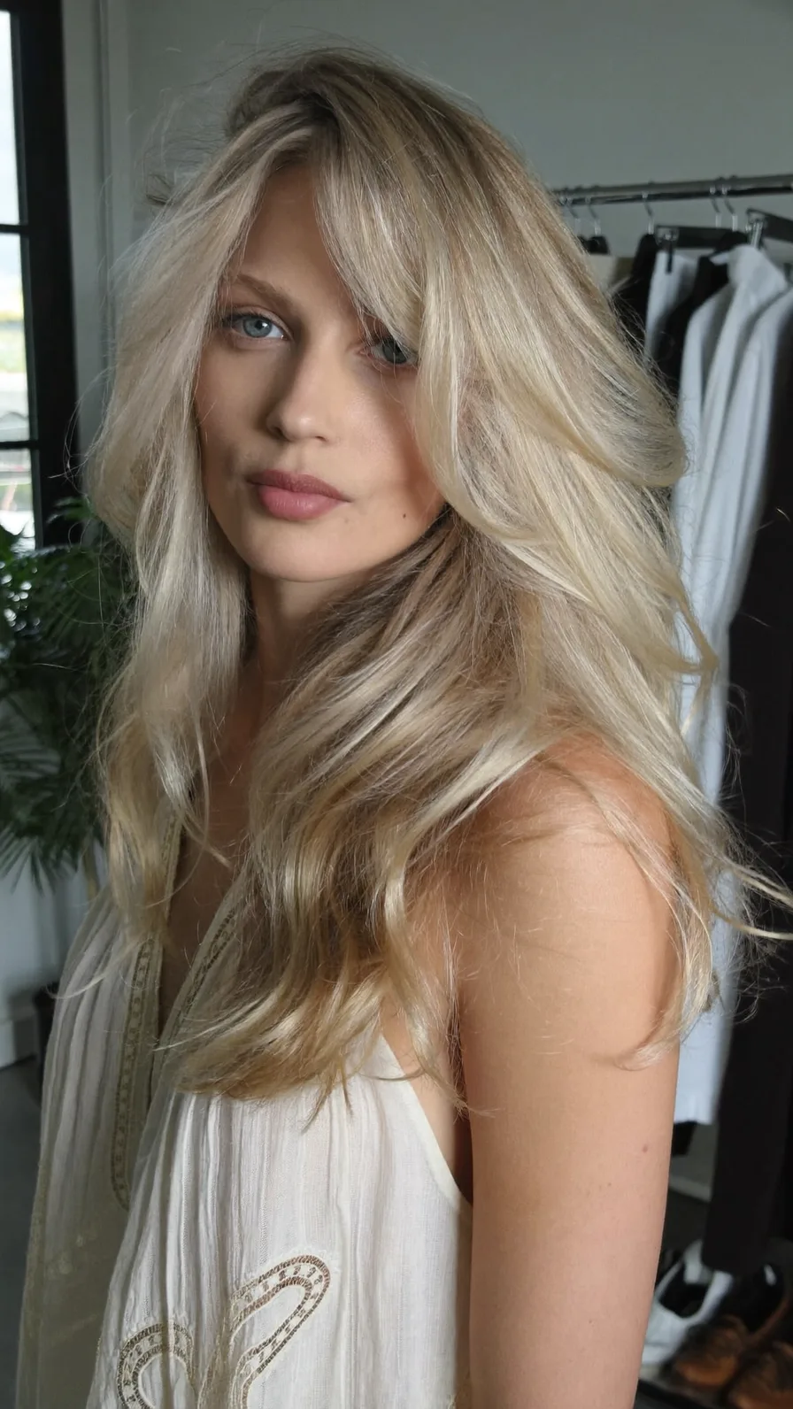 Voluminous Long Layered Hair with Soft Curtain Bangs