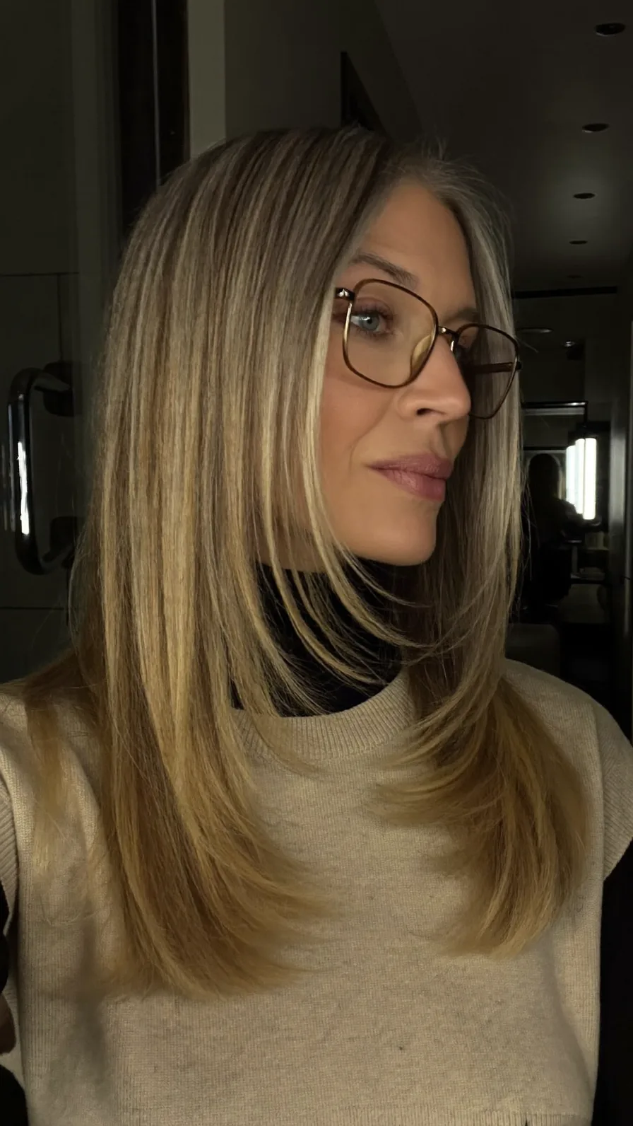 Elegant Long Layered Blonde Blowout with Soft Highlights