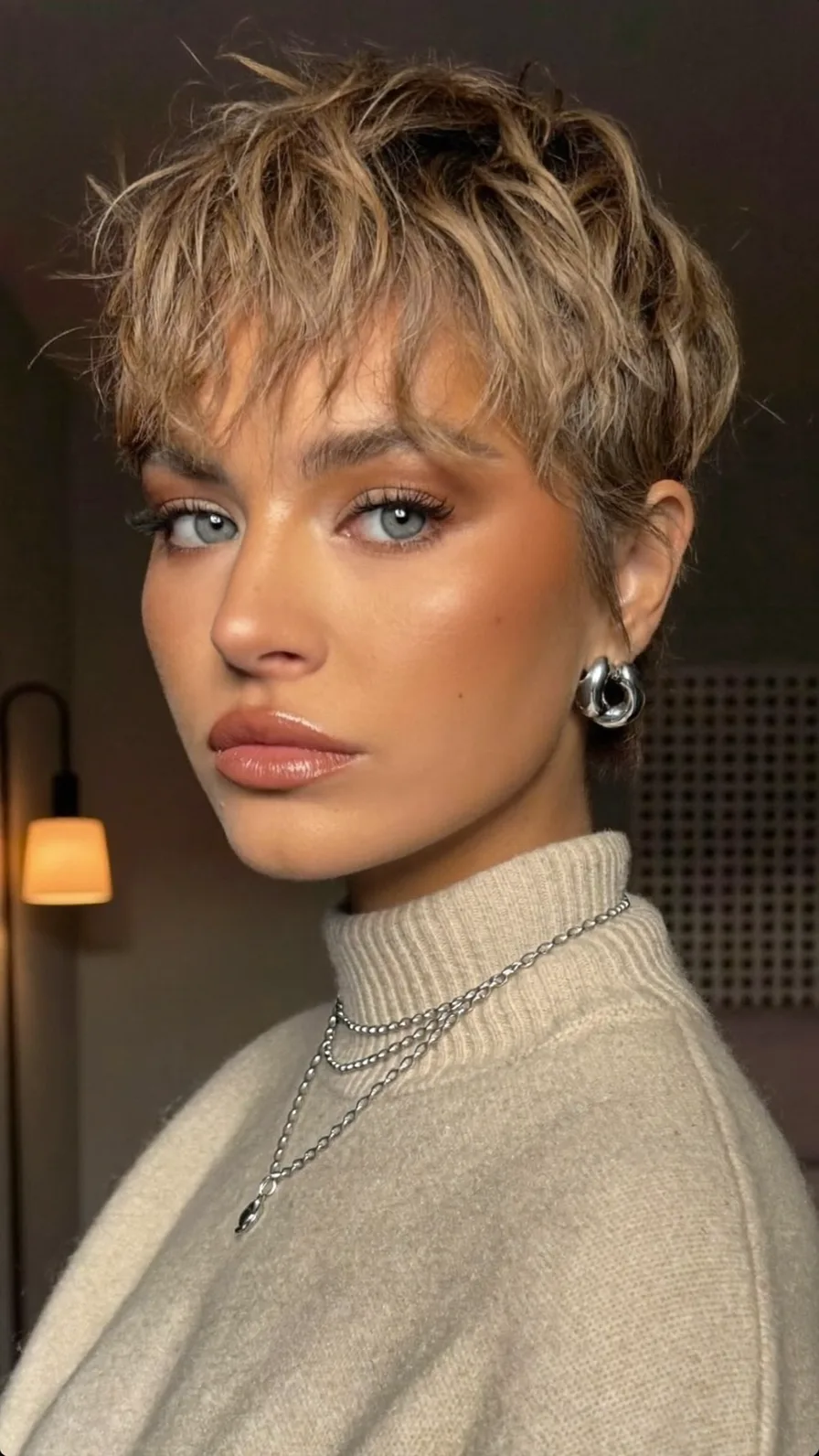 Textured Ash Blonde Pixie with Wispy Choppy Bangs