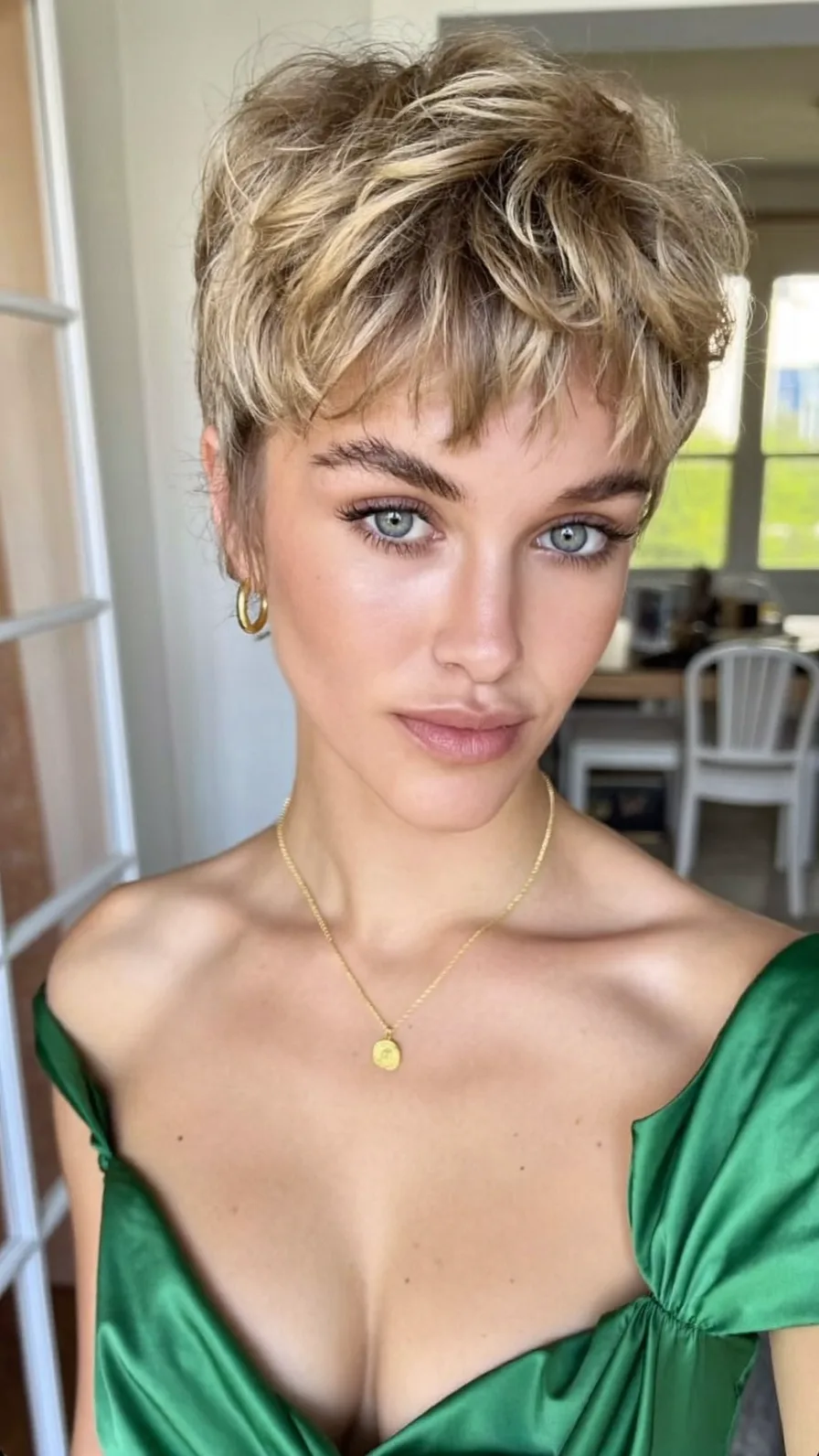 Modern Textured Pixie Cut with Wispy Blonde Highlights