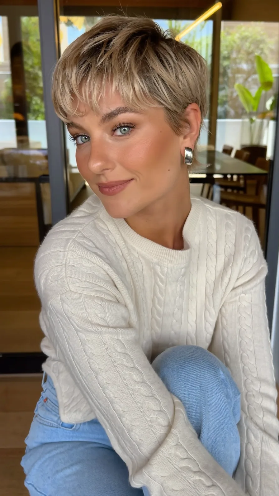 Modern Pixie Cut with Textured Wispy Bangs and Babylights