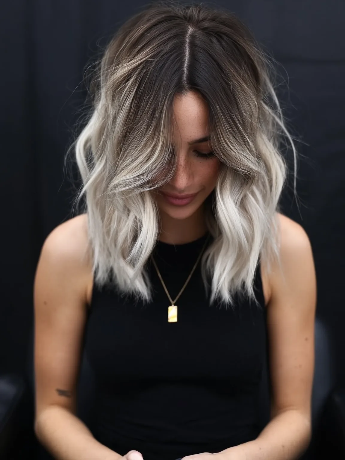 Voluminous Wavy Ashy Blonde Lob with Long Bangs