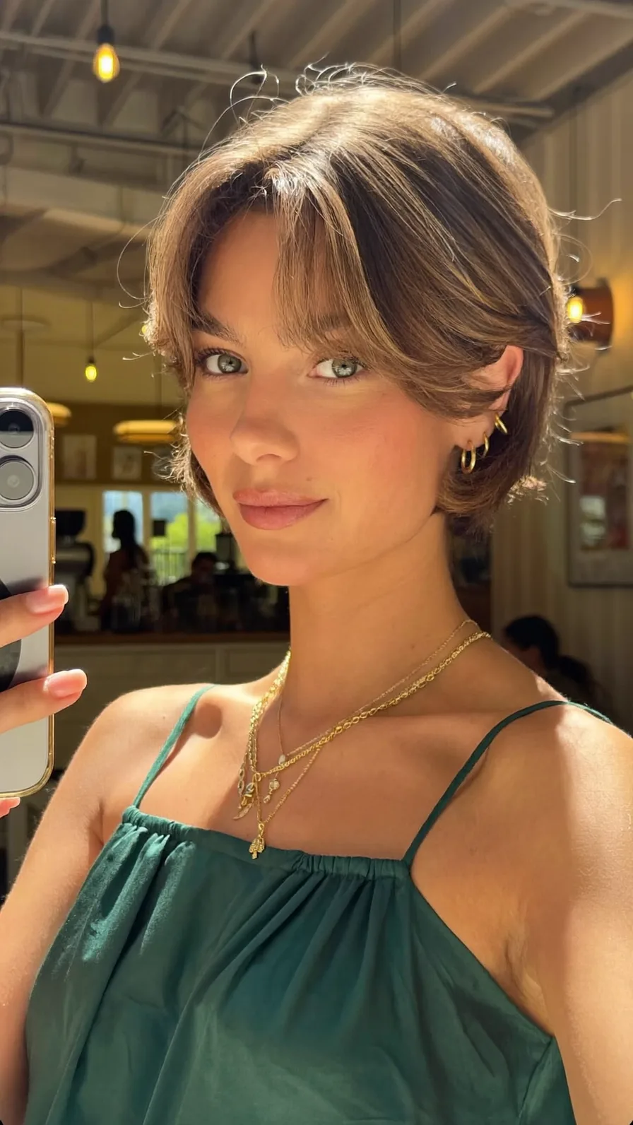 Chic Short Layered Bob with Soft Curtain Bangs Styling