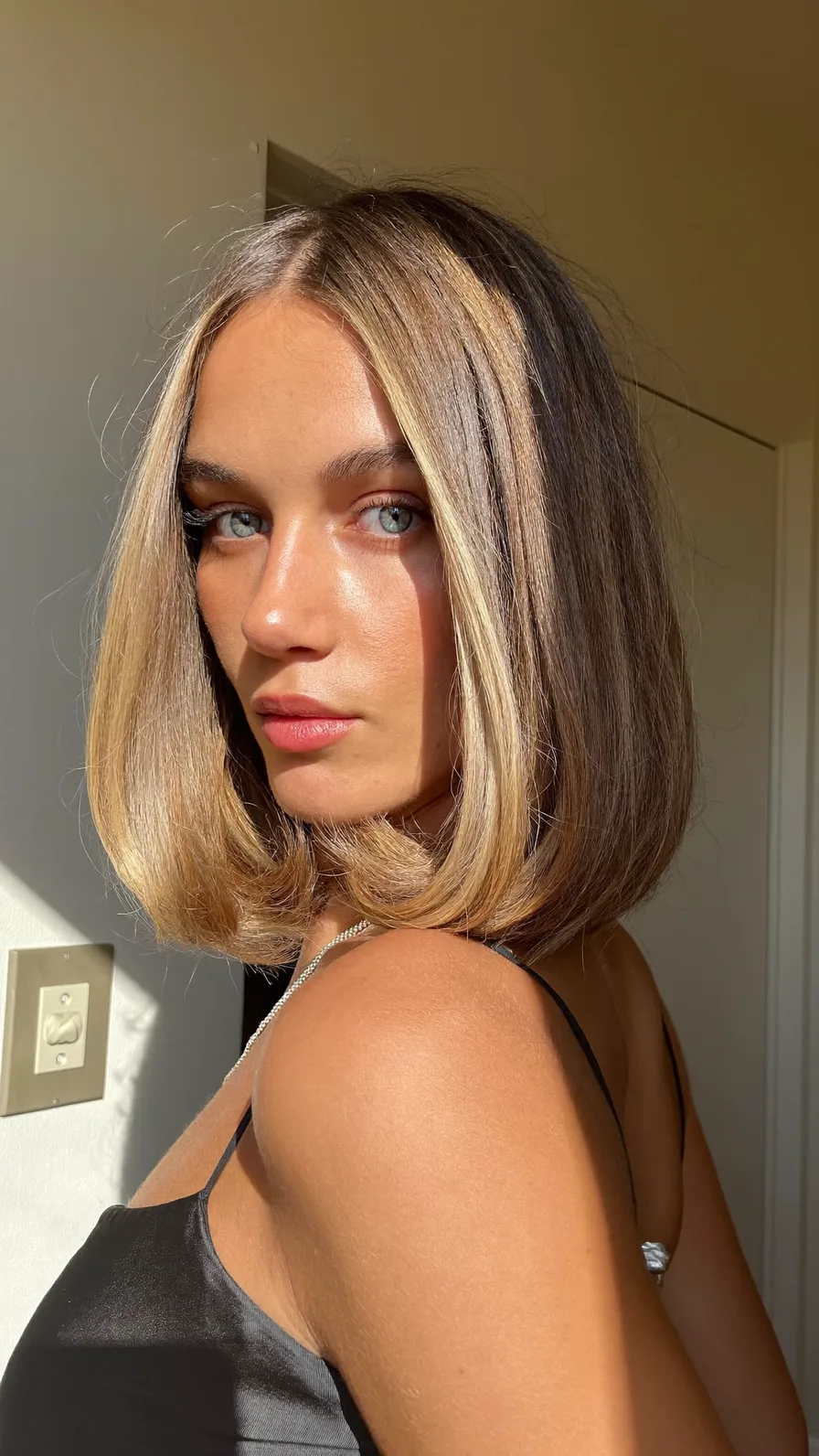 Sleek Rounded Blunt Bob with Honey Blonde Highlights