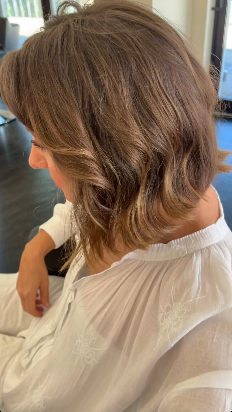 Soft Chin-Length Wavy Bob With Side-Swept Bangs