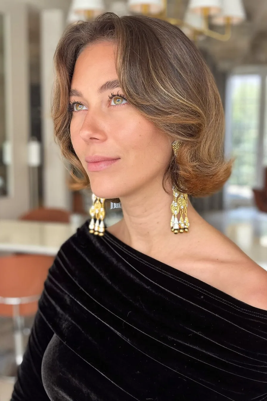 Elegant Chin-Length Flicked Bob with Subtle Highlight Dimension
