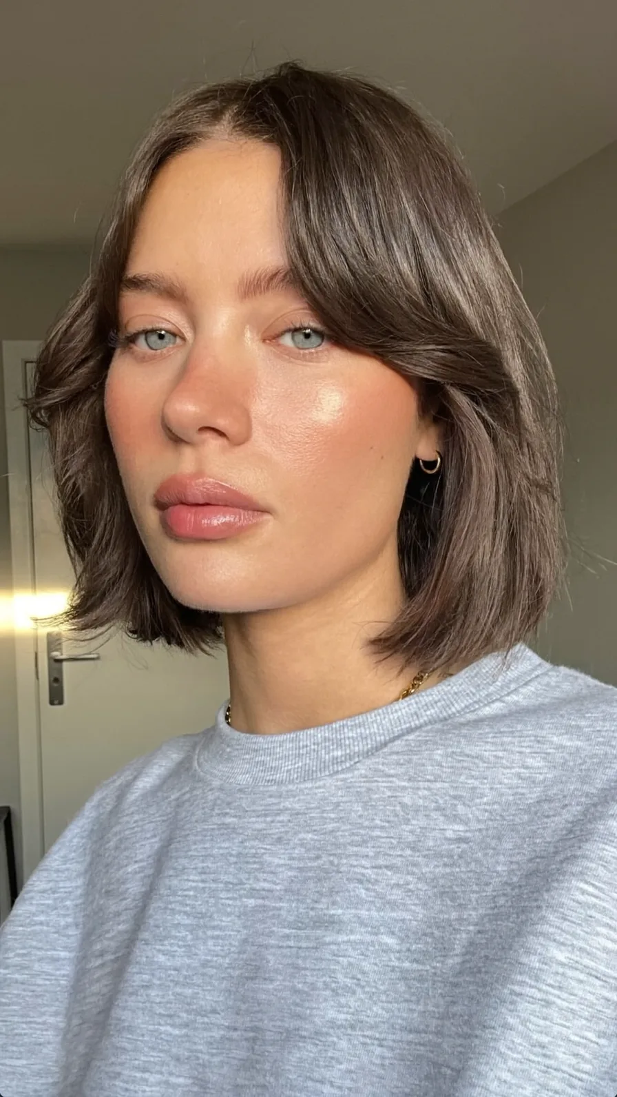 Chic Chin-Length Blunt Bob with Curtain Bangs