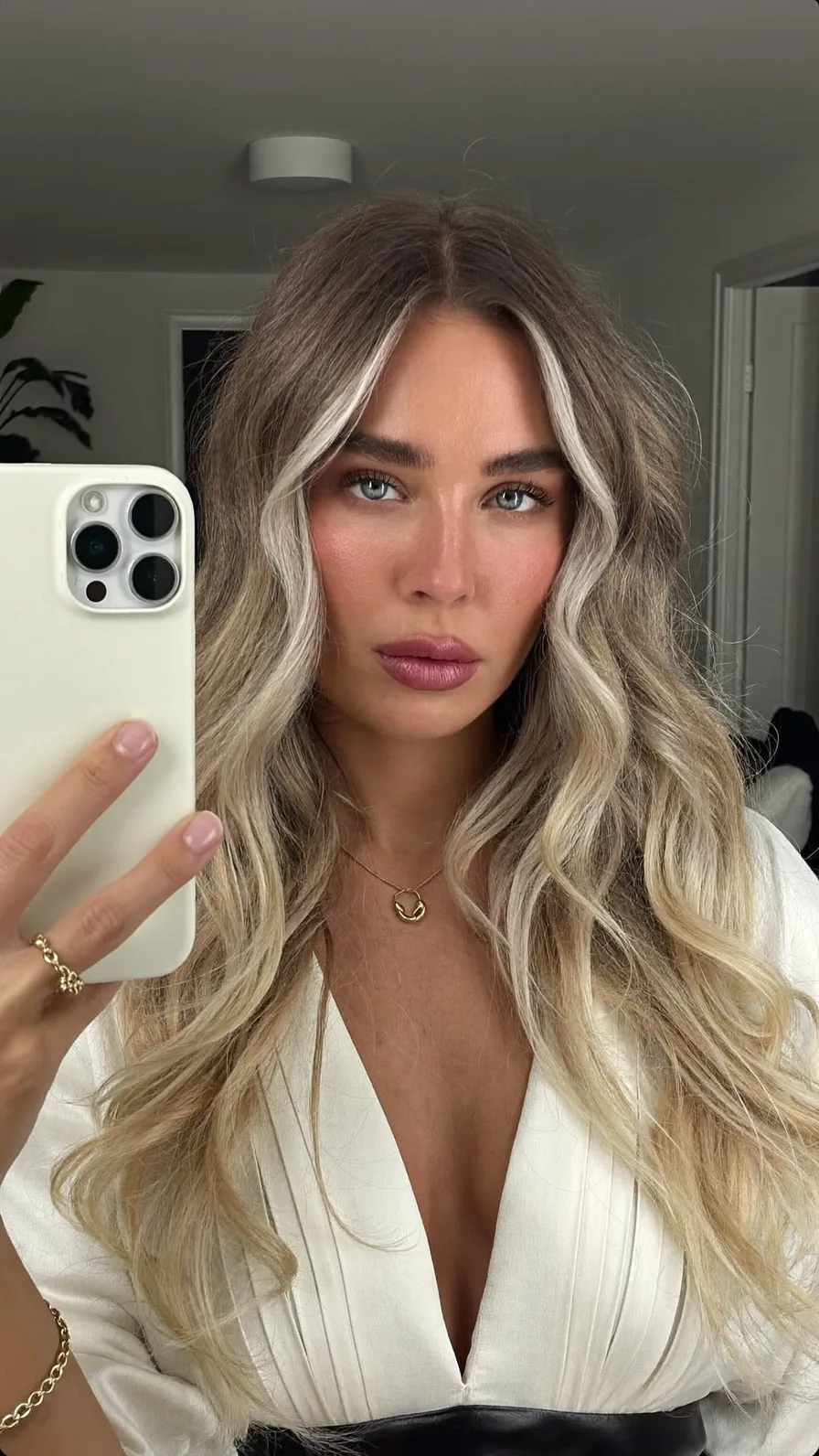 Modern Long Layered Waves with Blonde Money-Piece Highlights