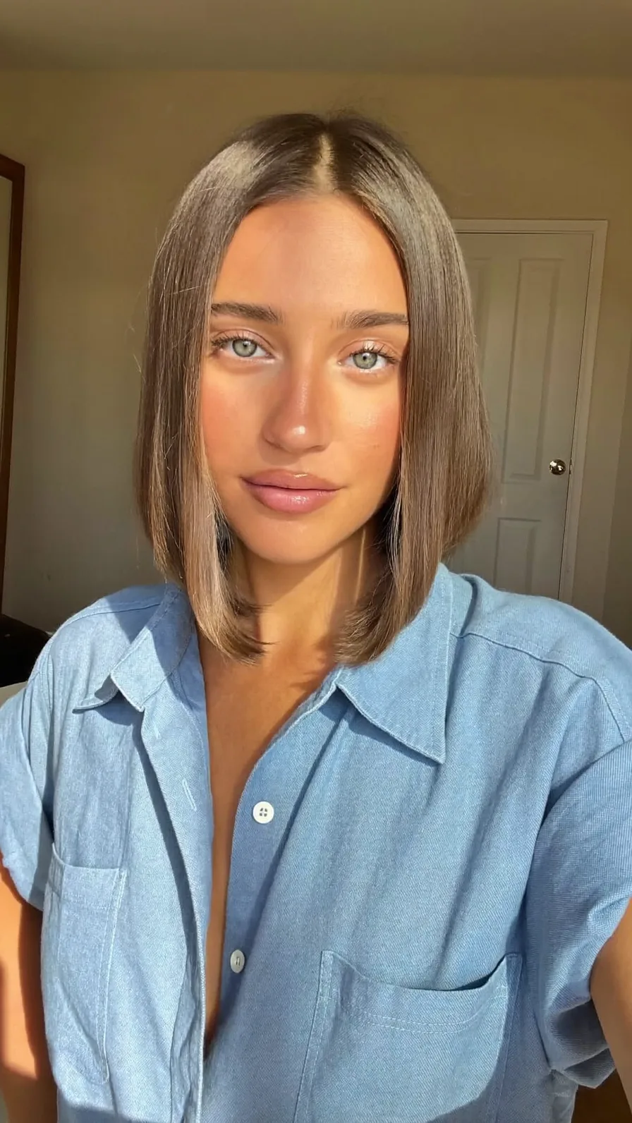 Sleek Chin-Length Blunt Bob with Center Part