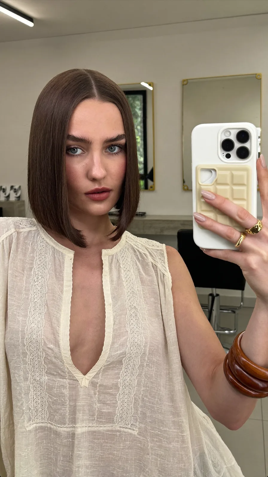 Sleek Center-Parted Blunt Chin-Length Bob Hairstyle