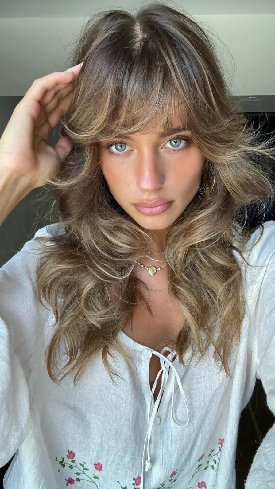 Voluminous Feathered Long Layers with Balayage Curtain Bangs