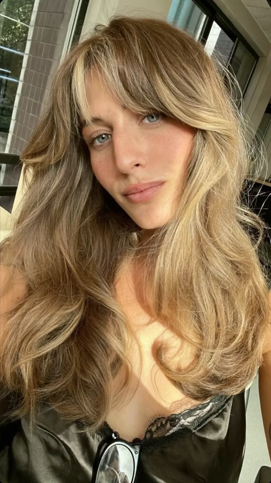 Warm Blond Long Layers with Feathered Curtain Bangs Style
