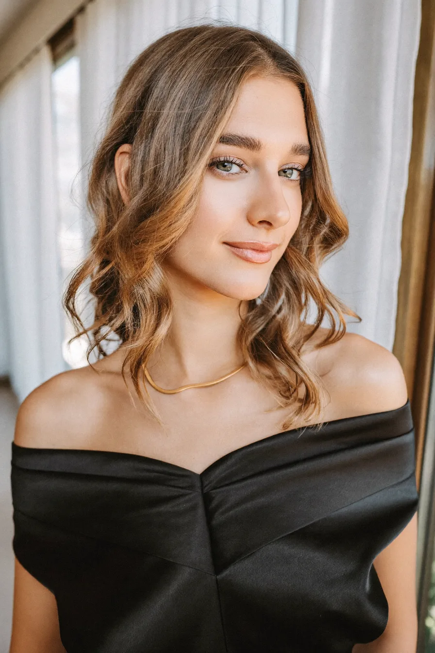 Soft Layered Balayage Waves with Center Curtain Bangs