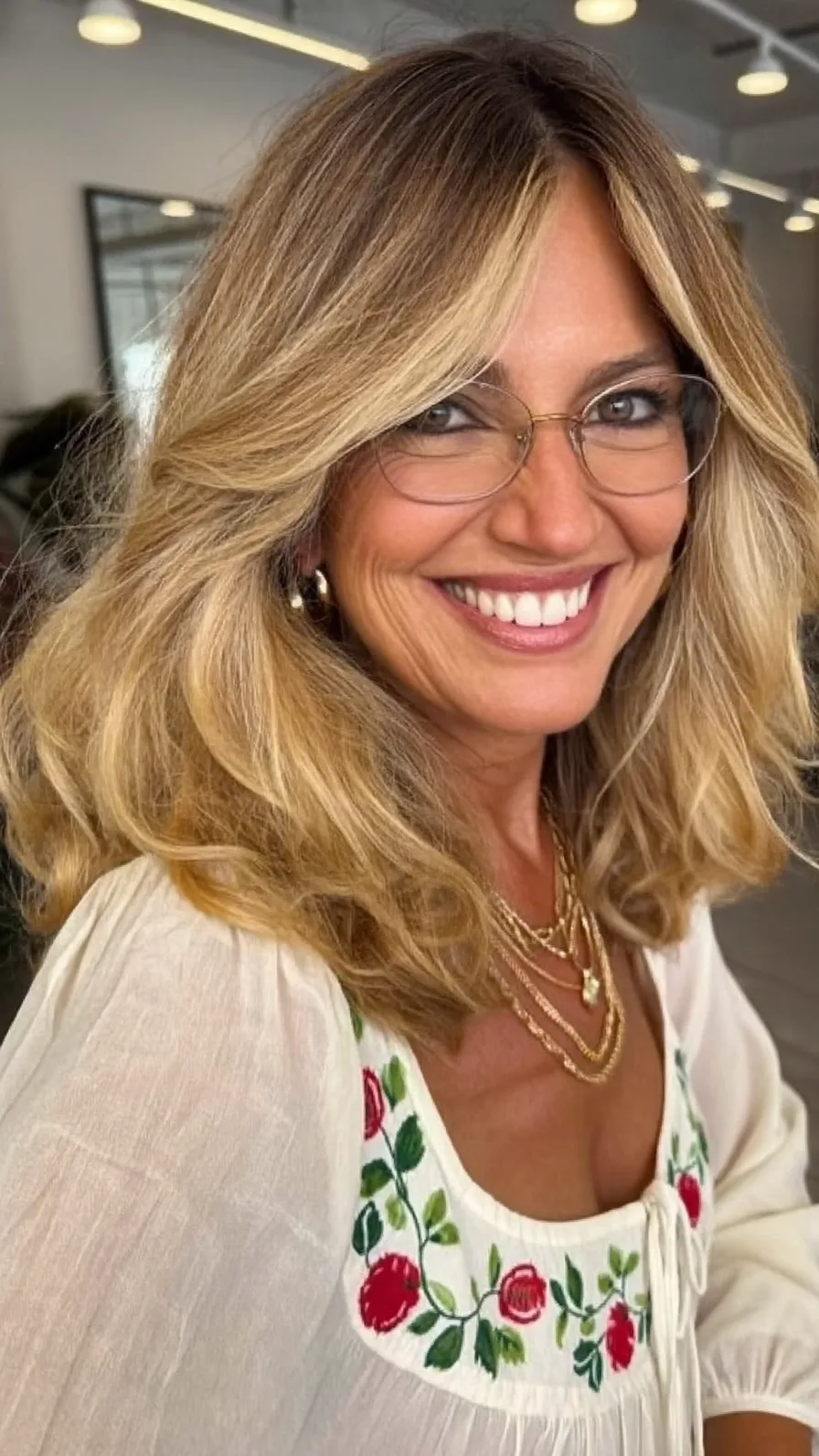 Soft Layered Honey Blonde Lob with Framing Curtain Bangs