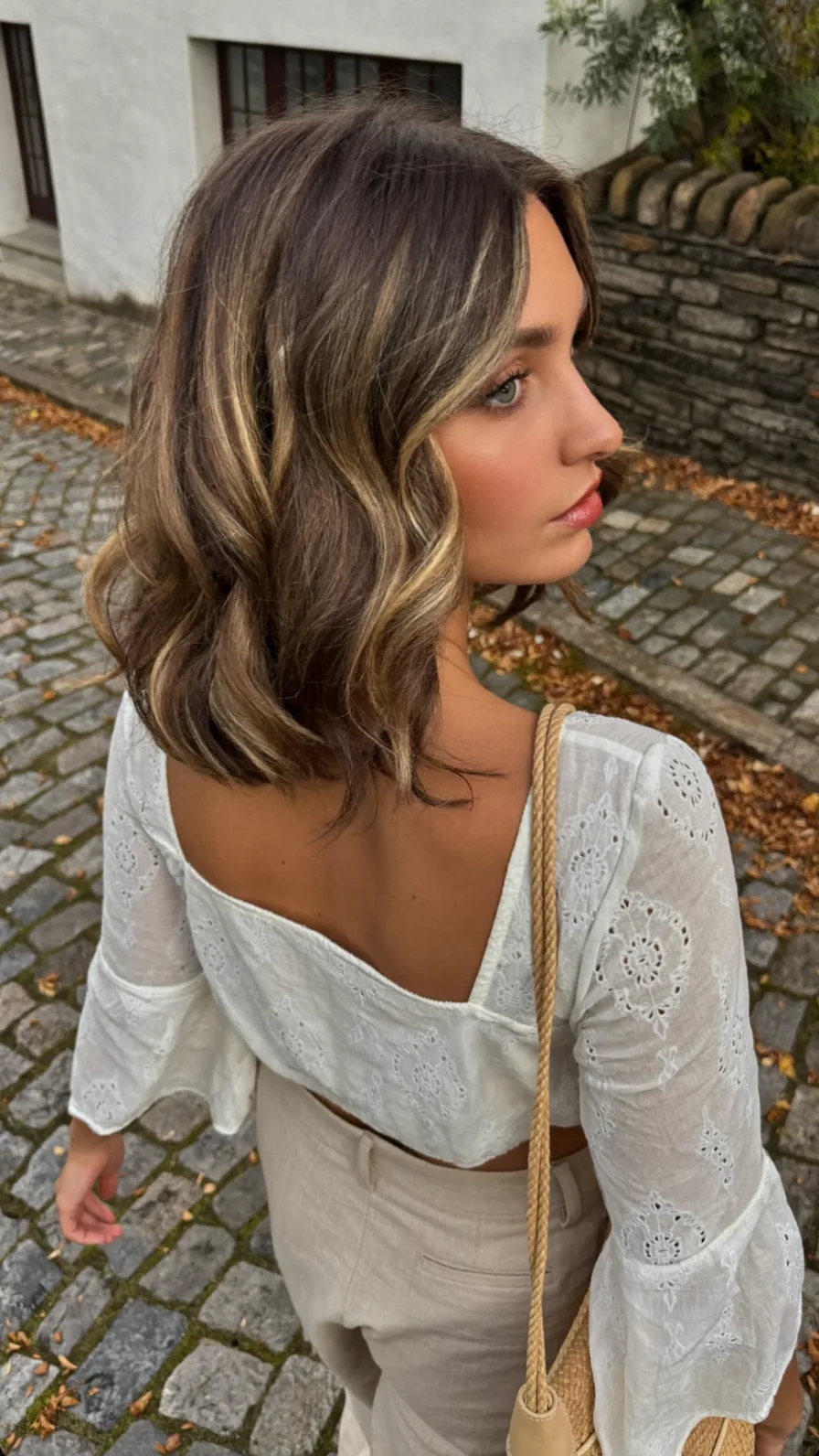 Modern Shoulder-Length Lob with Balayage and Curtain Bangs
