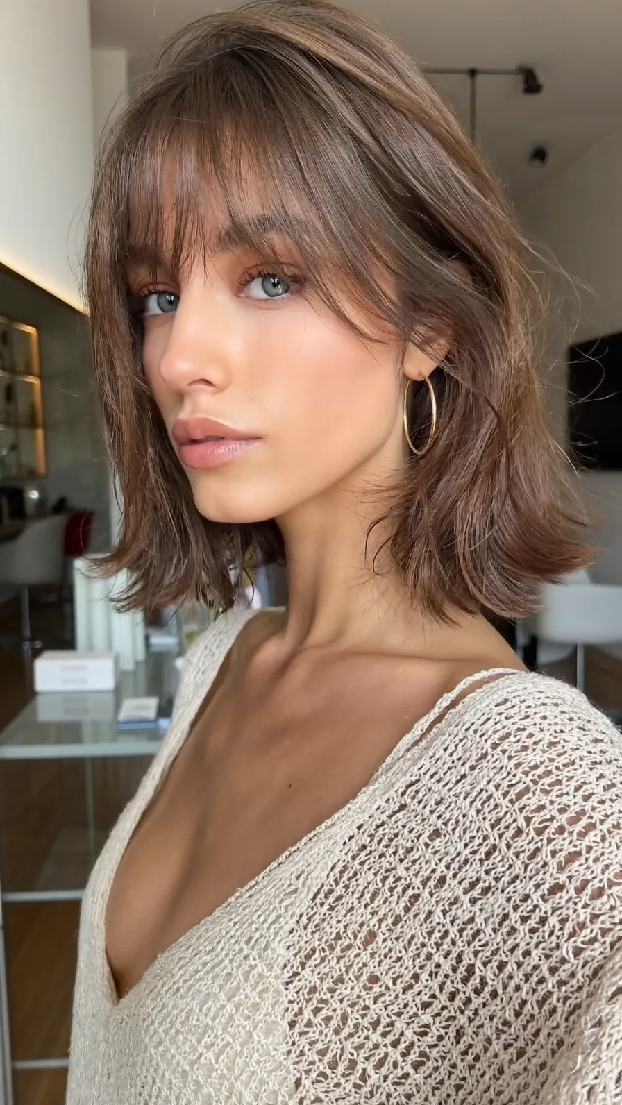 Textured Shoulder-Length Lob with Ash Brown Curtain Bangs