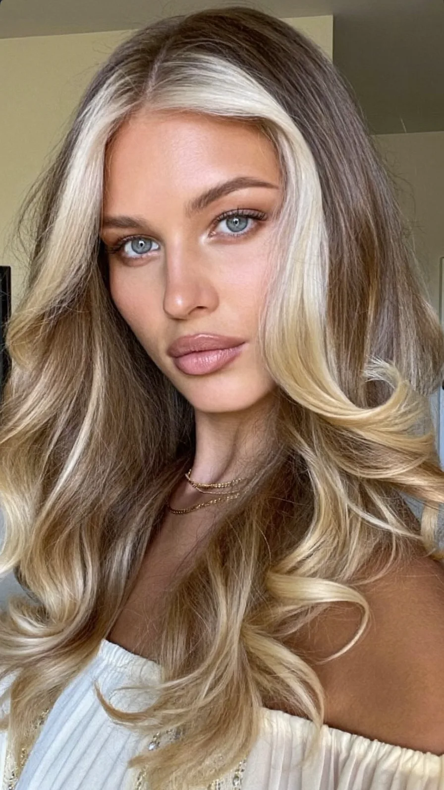 Voluminous Long Layers with Platinum Money-Piece Front Highlights