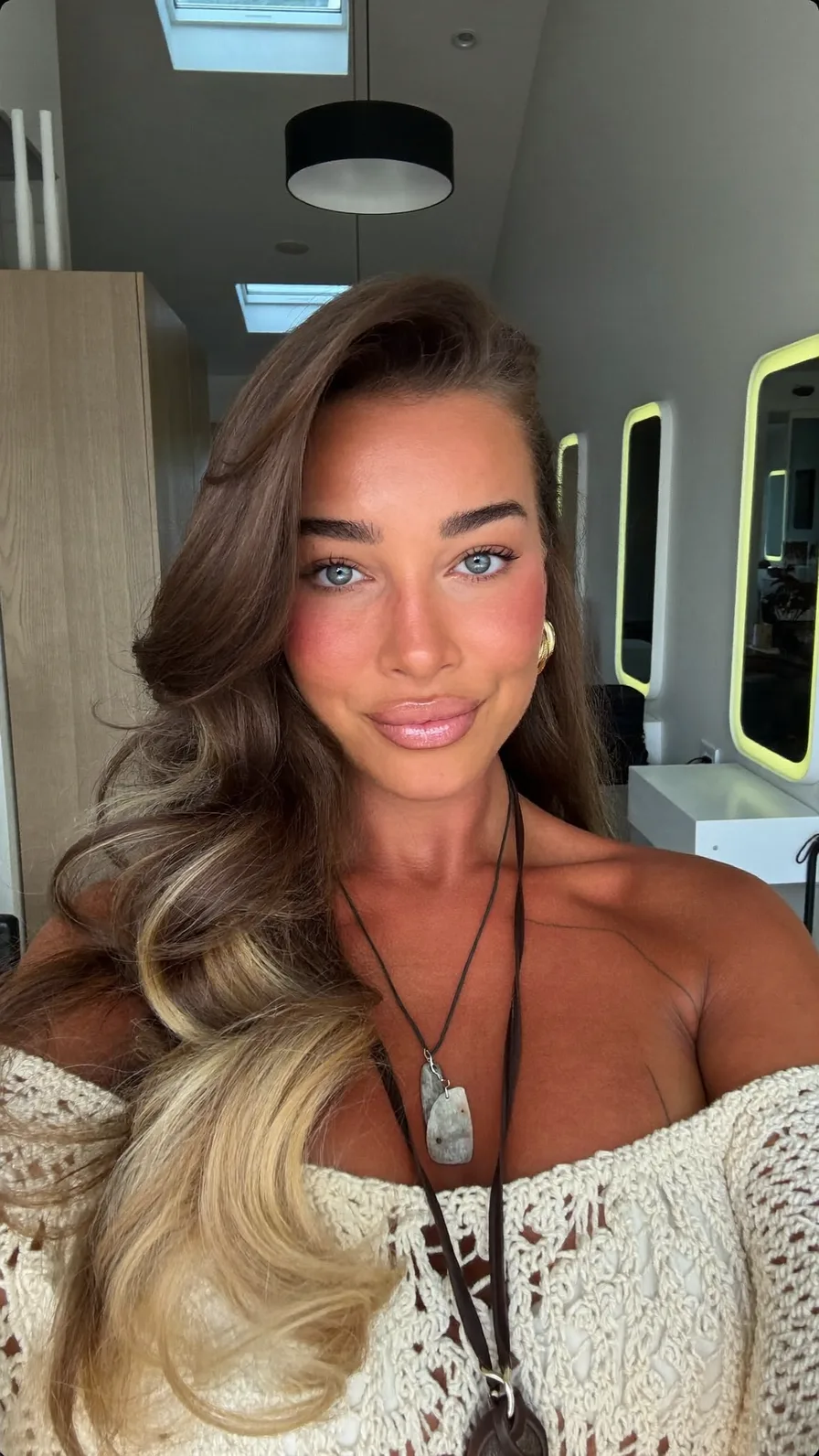 Voluminous Long Layered Waves with Blonde Balayage Highlights