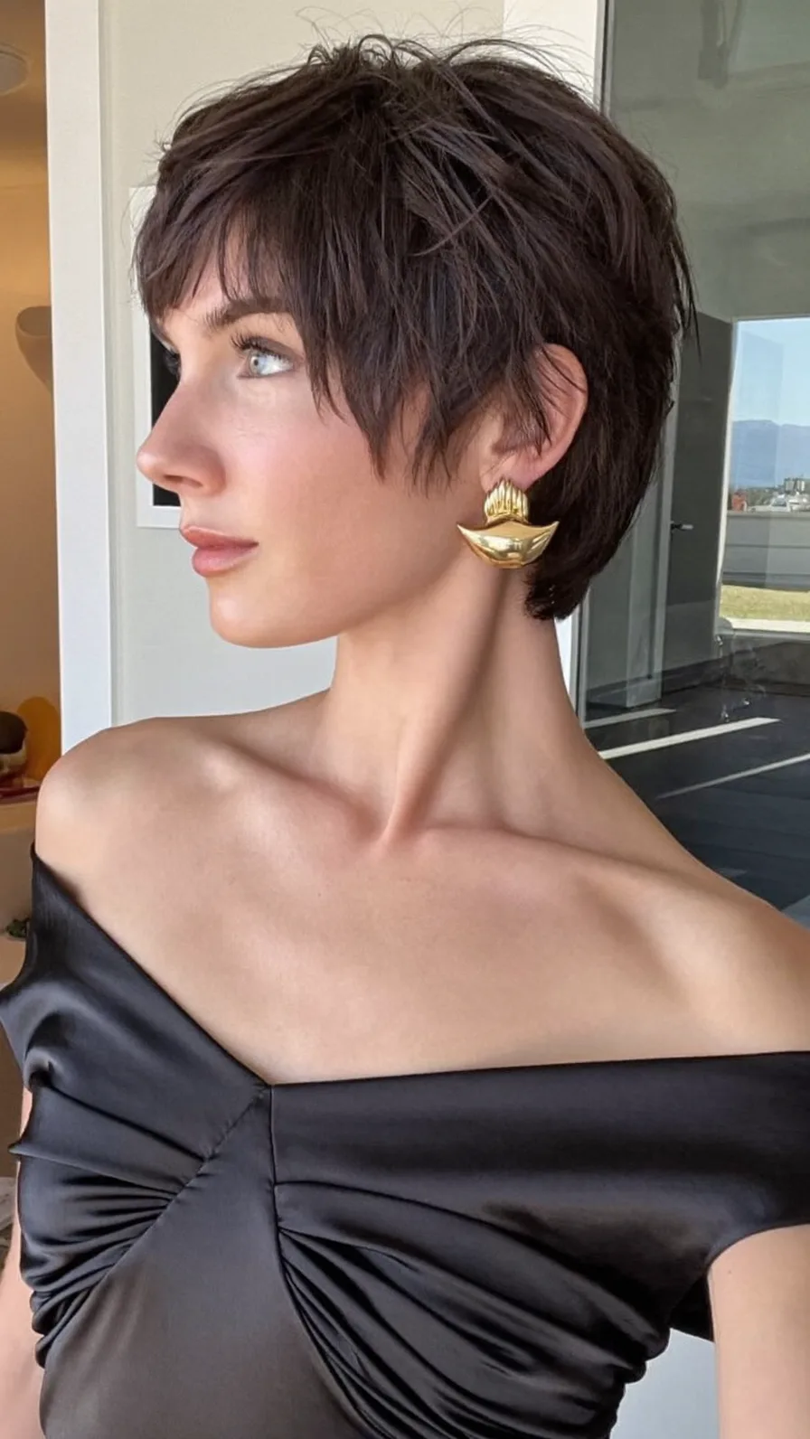 Textured Short Pixie Cut with Side-Swept Bangs