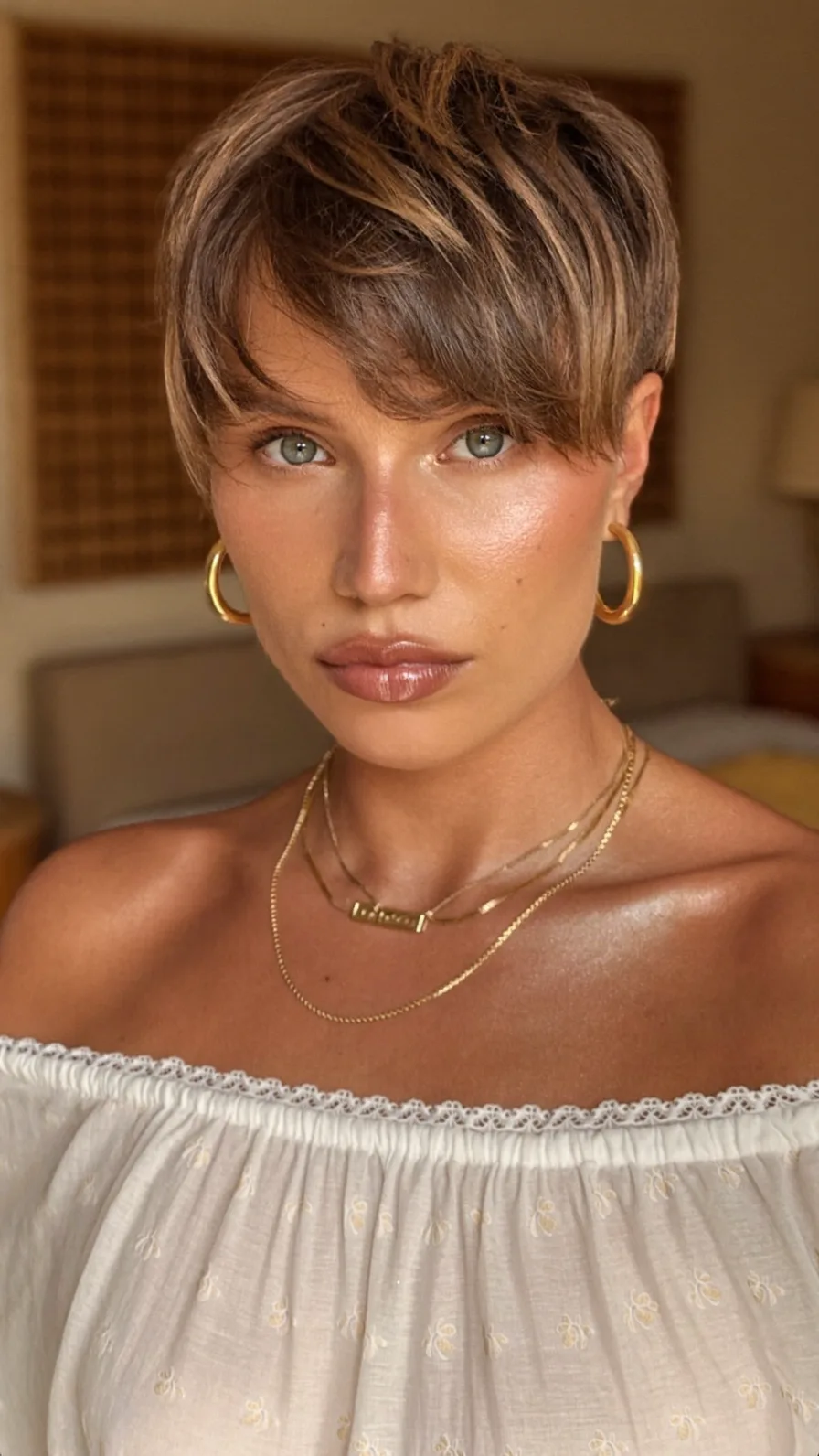 Textured Pixie Cut with Side-Swept Balayage Highlights