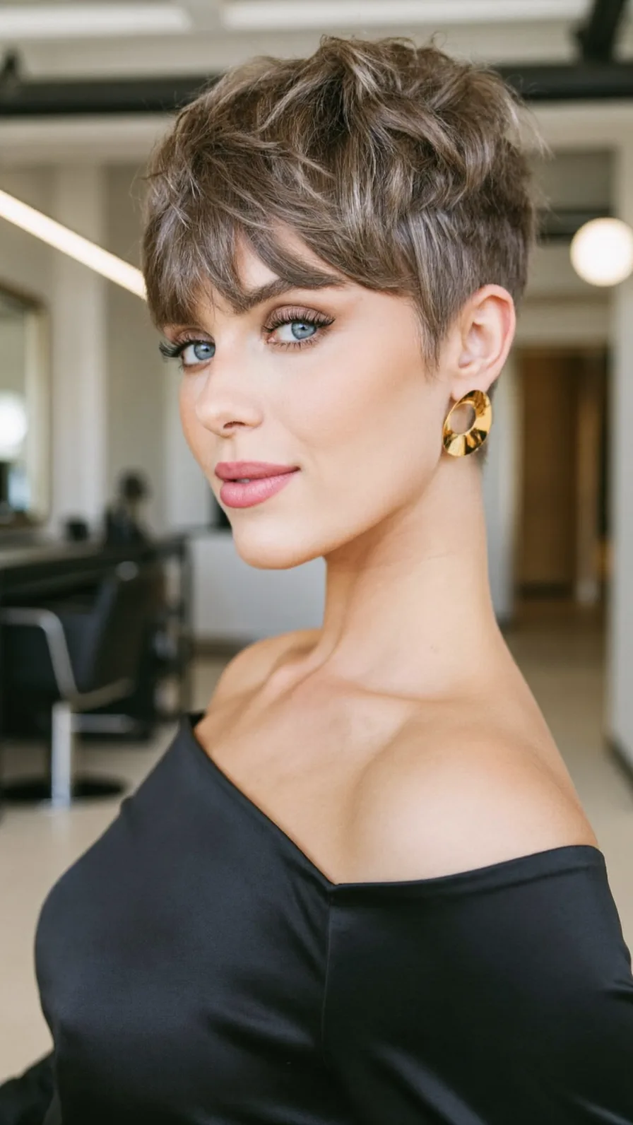 Modern Textured Pixie Cut with Side-Swept Bangs and Highlights