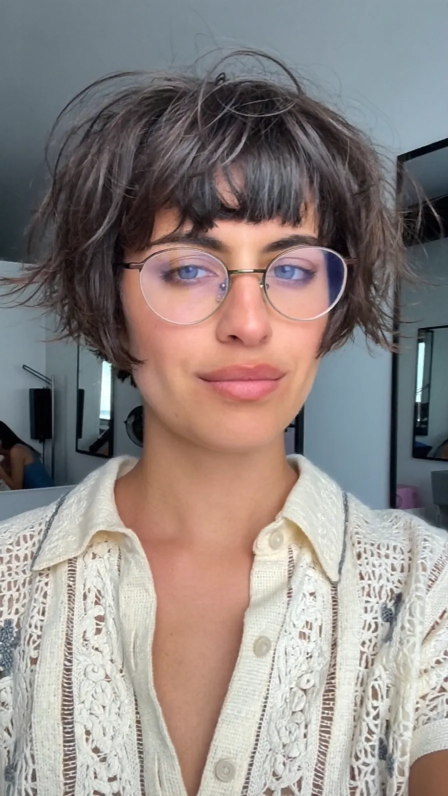Textured Chin-Length Shag with Blunt Bangs and Voluminous Layers