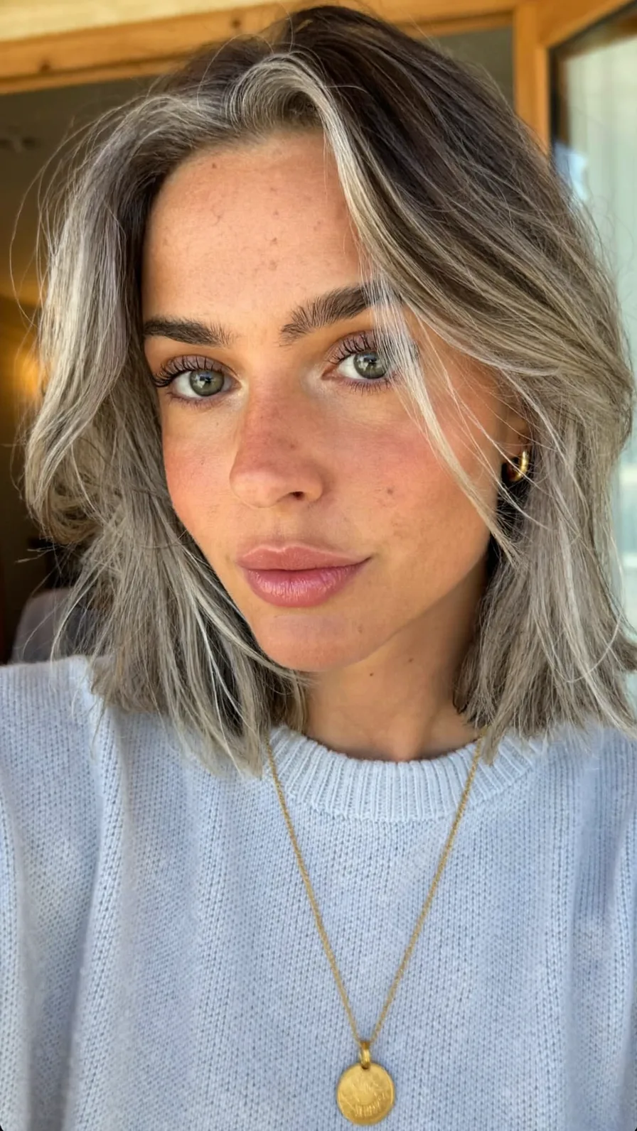 Modern Ash Gray Shoulder-Length Lob with Feathered Ends